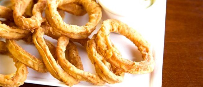 Кольца из лука под кисло-сладким соусом