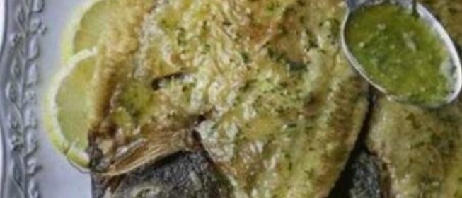 Обжаренные кусочки филе морского языка в томатном кисло-сладком соусе