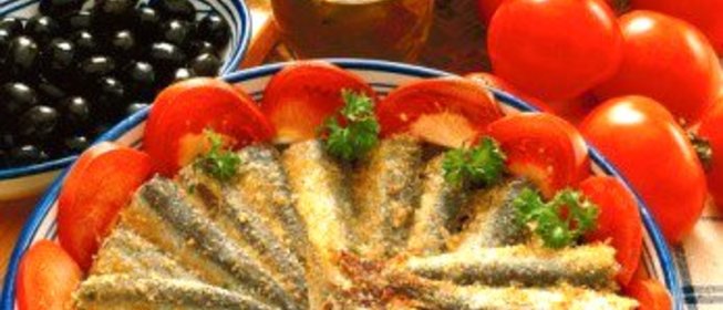 Сардины, запеченные с белым вином и панировочными сухарями