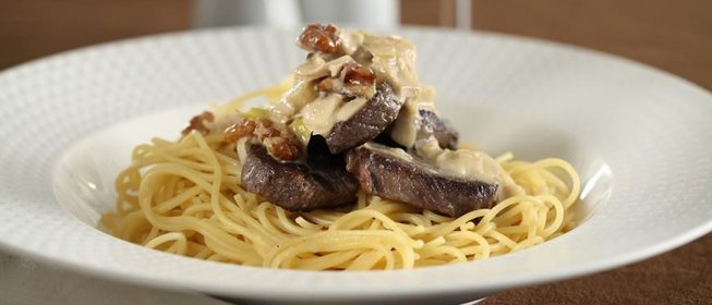 Говядина в сливочном соусе