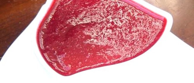 Язык под ягодным соусом