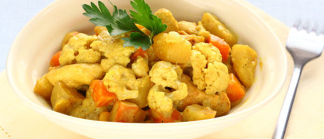 Куриные бедрышки с овощным рагу