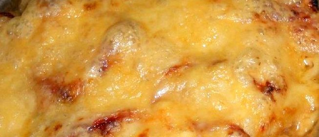 Свинина под овощами с сыром