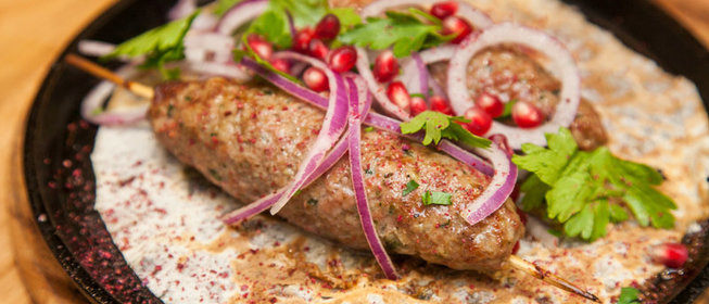 Свинина, тушенная с луком и морковью