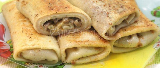 Фаршированные блины с грибами и сыром