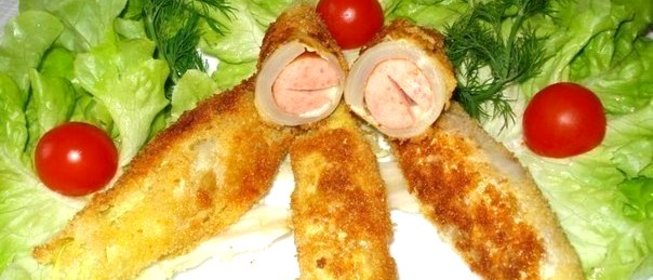 Сосиски с сыром в капусте