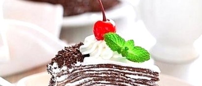 Торт из шоколадный блинчиков со сливочно-шоколадным кремом