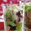 Салат с кальмарами, курицей и фисташками
