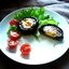 Грибы, фаршированные перепелиными яйцами