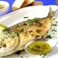 Жареный морской лещ с зеленью