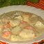 Свинина с картофелем и овощами в сырном соусе