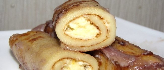 Блинчики с творогом, запеченные в сметане